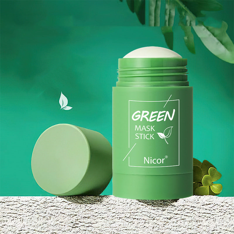 Green mask stick with Nicor branding on a green background with leaves.
