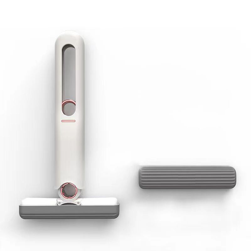 White and gray cleaning tool with a squeegee on a white background