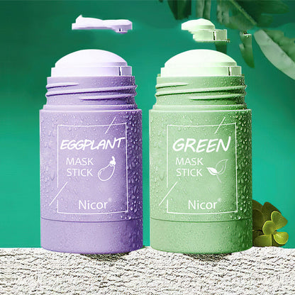 Purple and green mask sticks with 'Nicor' branding on a textured surface with green leaves.