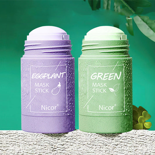Two mask sticks, one purple and one green, with 'Nicor' branding on a textured surface.